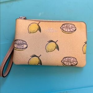 Coach Lemon Patterned Wristlet in Yellow